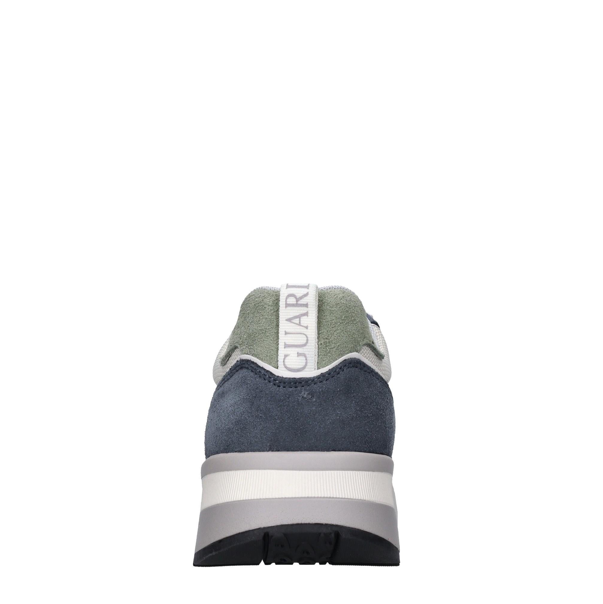 Sneakers in pelle e tessuto 