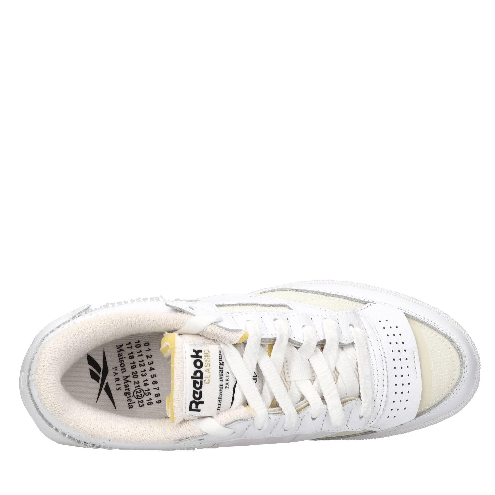 Sneakers in pelle e tessuto 