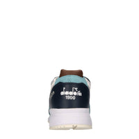 Sneakers in pelle,camoscio e tessuto 