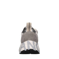 Sneakers in pelle e tessuto 