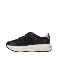 Sneakers in pelle scamosciata, tessuto e inserti in pelle 