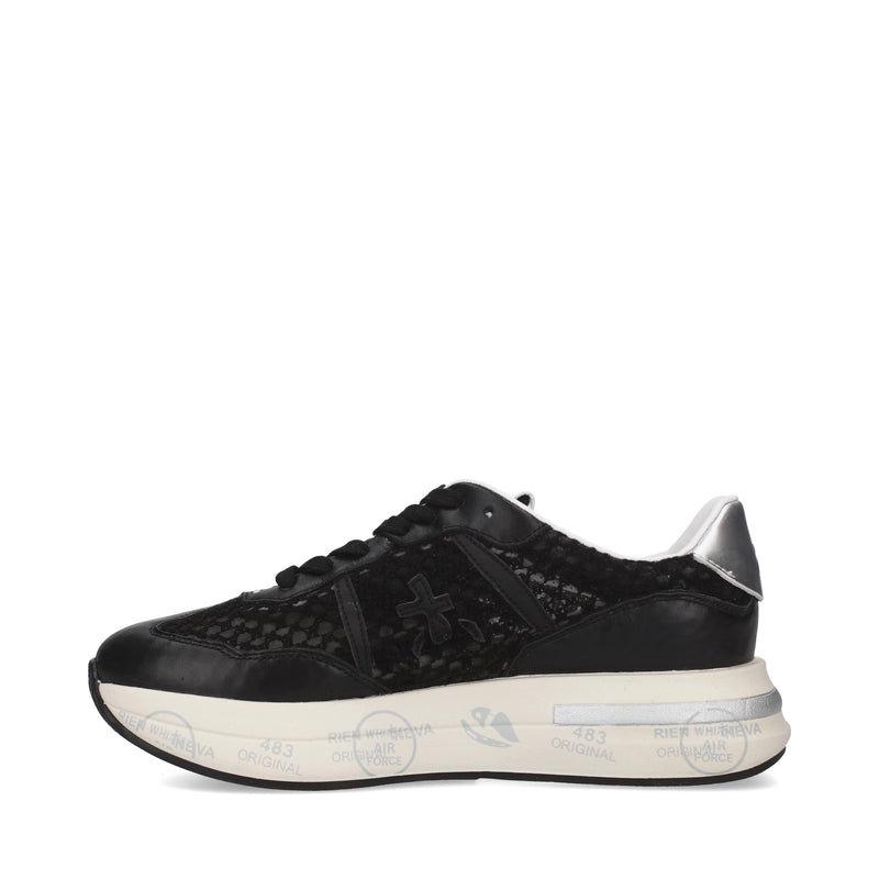Sneakers in pelle scamosciata, tessuto e inserti in pelle 