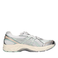 Sneakers in ecopelle e tessuto 
