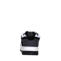 Sneakers in pelle e tessuto 