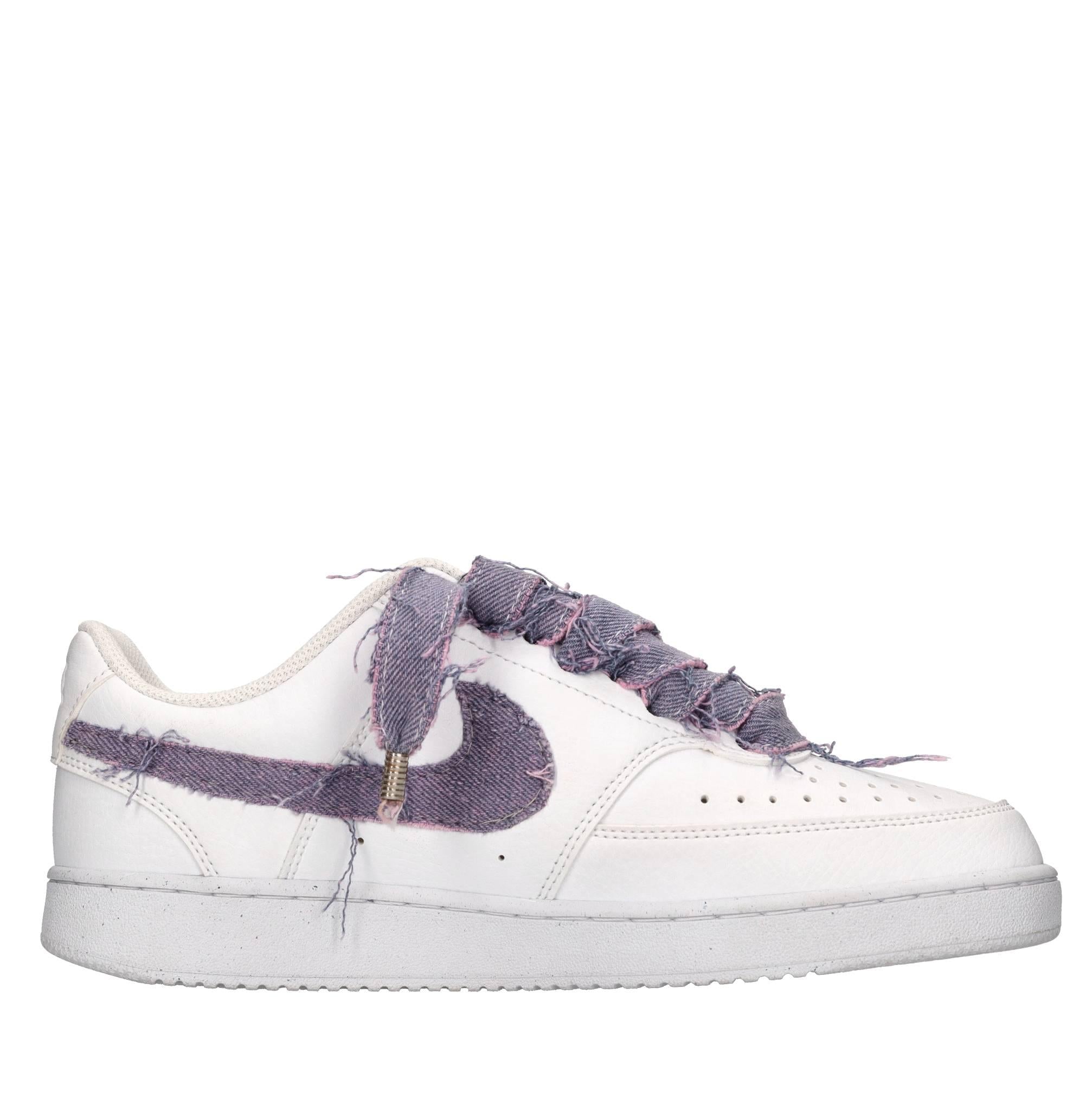 Sneakers in ecopelle e tessuto 