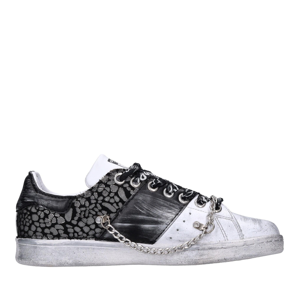 Sneakers in pelle e tessuto 