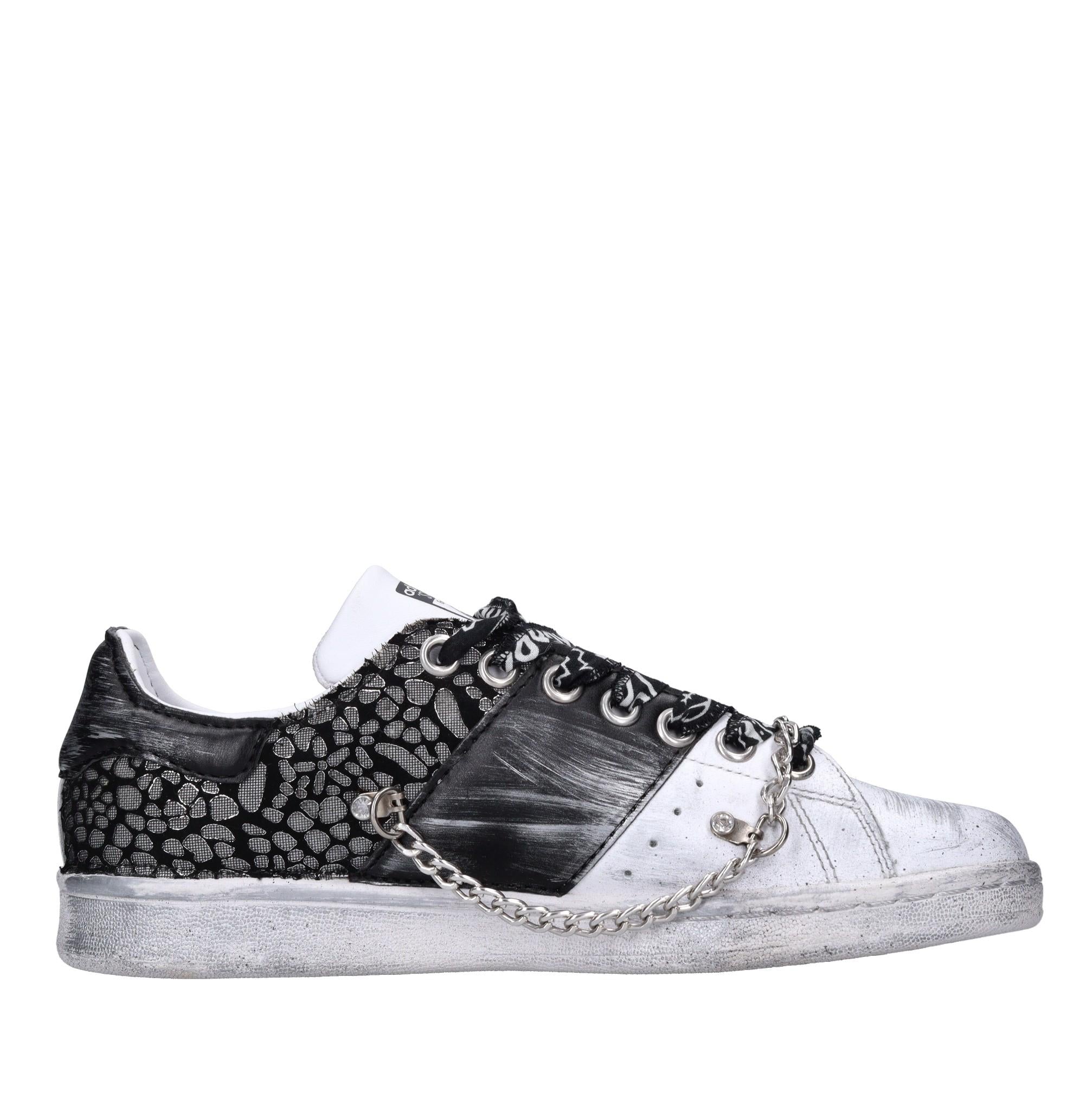 Sneakers in pelle e tessuto 