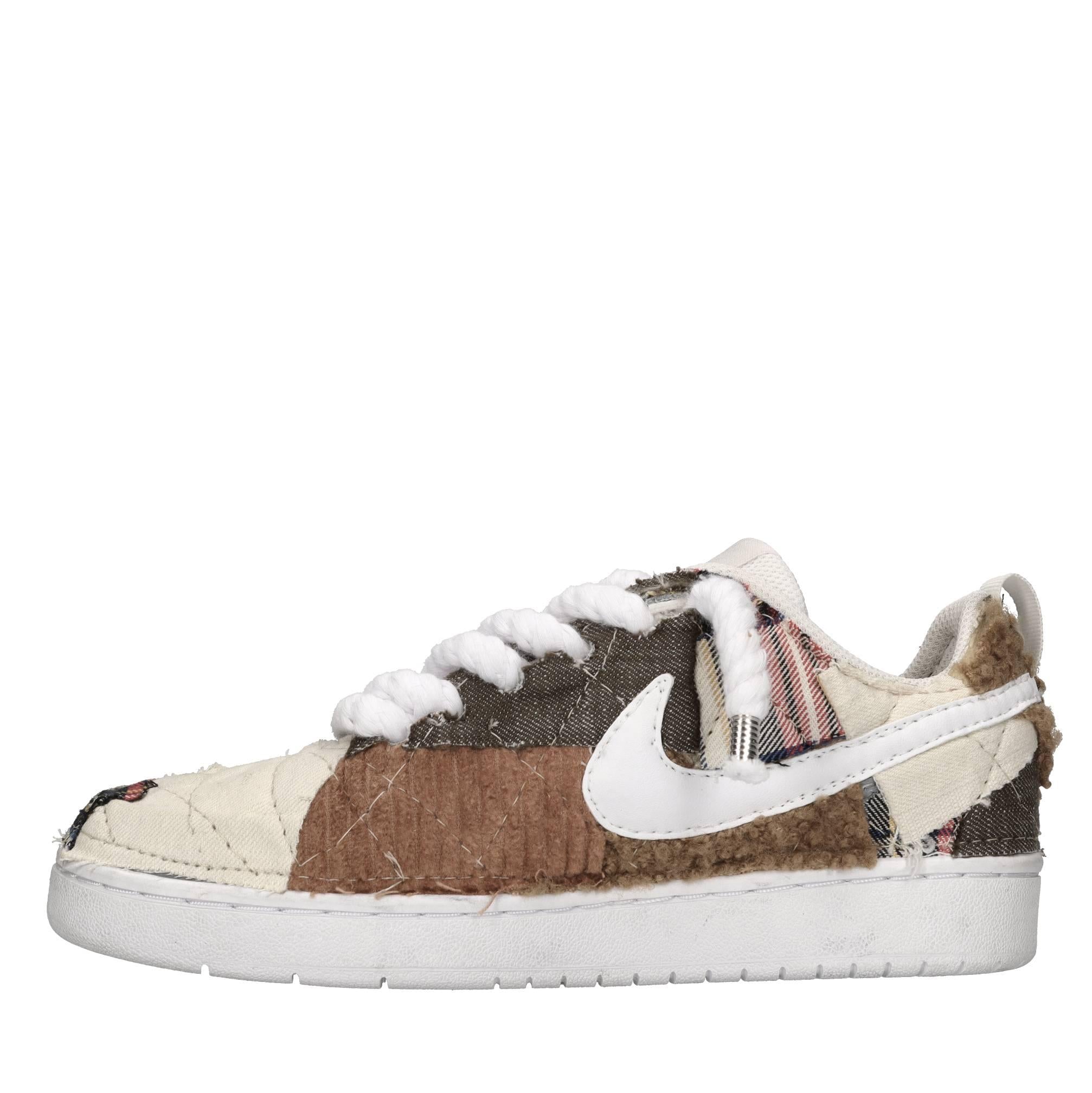 Sneakers in ecopelle e tessuto 