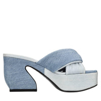 Mules in pelle e tessuto 