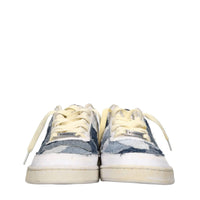 Sneakers in ecopelle e tessuto 