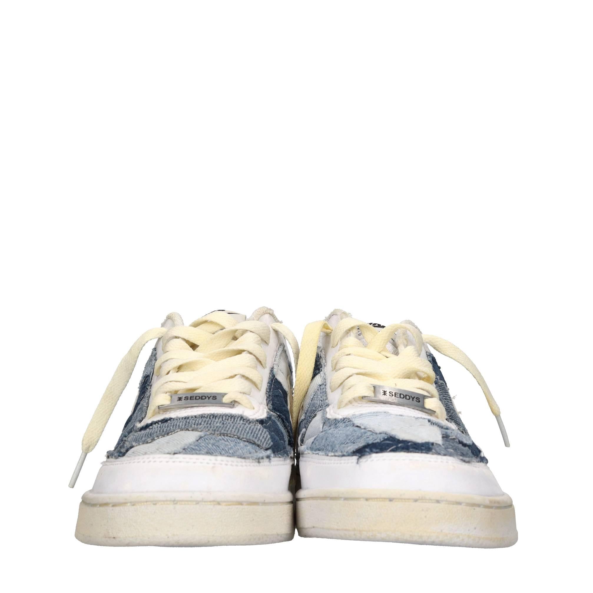 Sneakers in ecopelle e tessuto 
