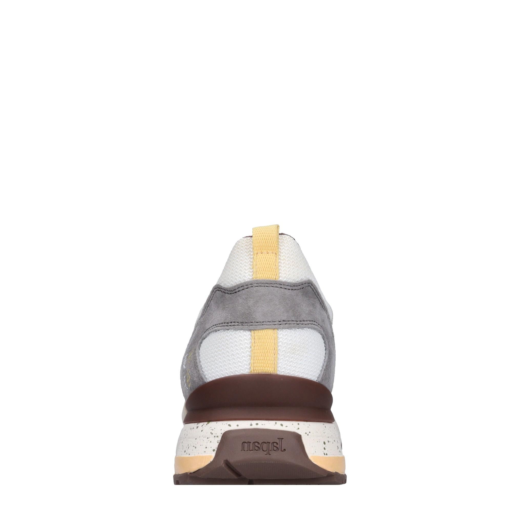 Sneakers in pelle e tessuto 