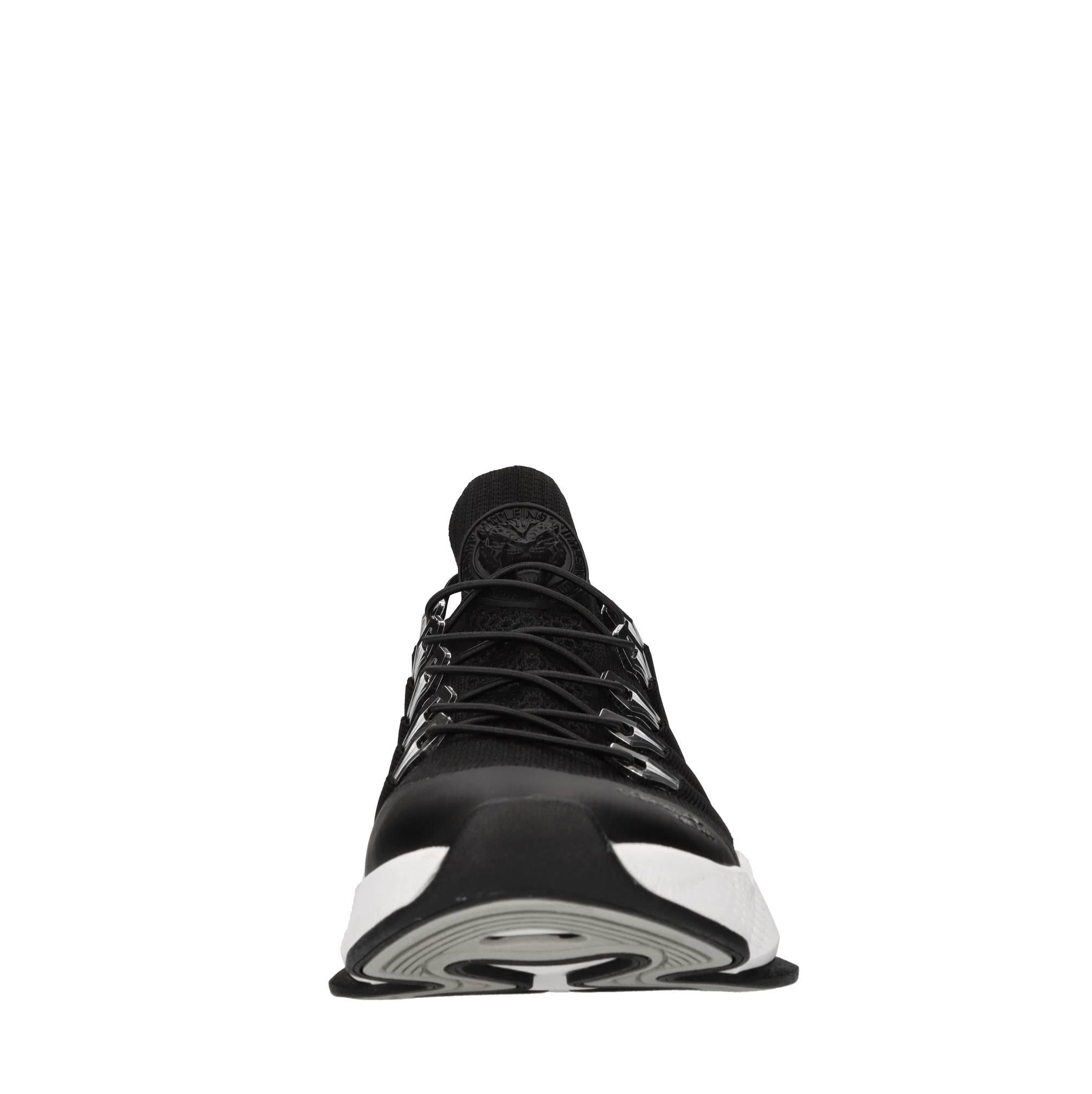 Sneakers in ecopelle e tessuto 