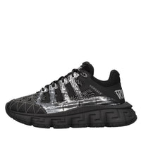 Sneakers in pelle e tessuto 