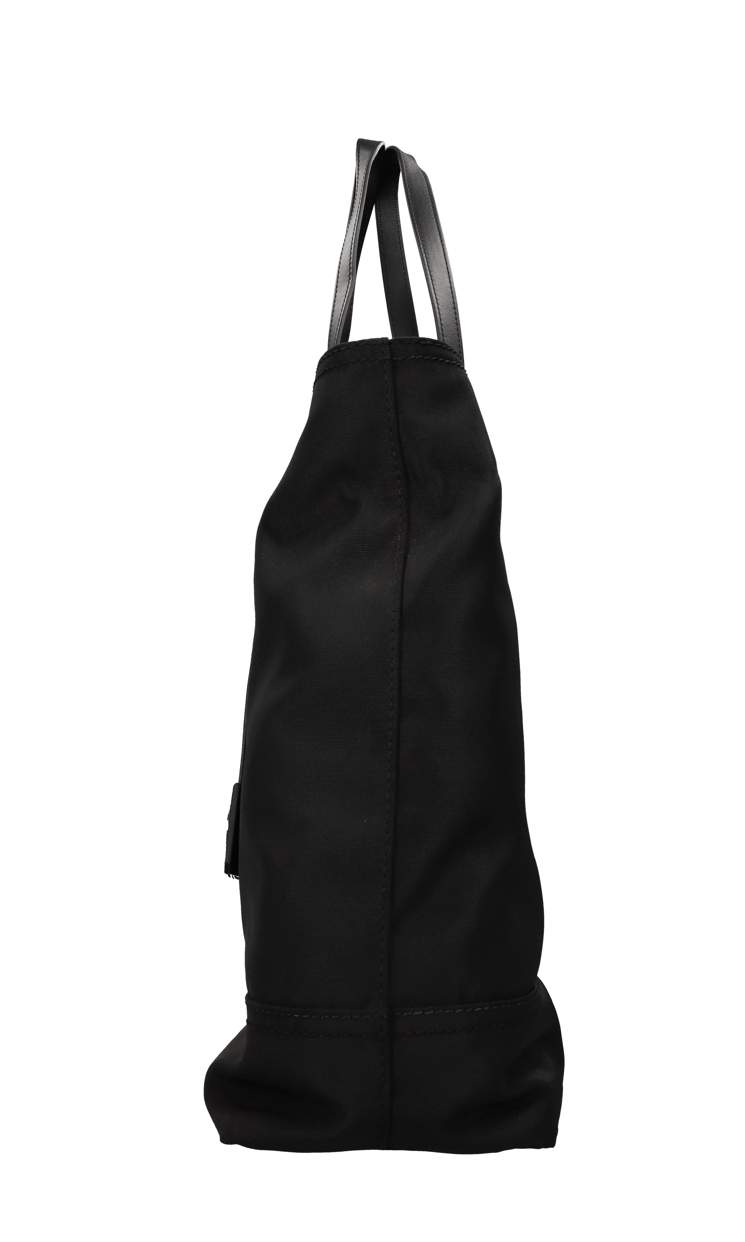 Borsa in tessuto e pelle 