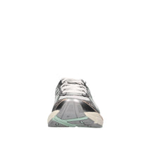 Sneakers in ecopelle e tessuto 
