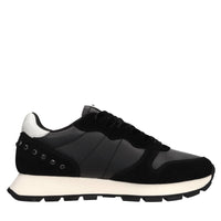 Sneakers in pelle, tessuto ed ecopelle 