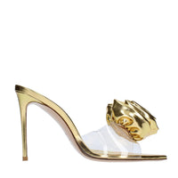 Mules in pelle e PVC 