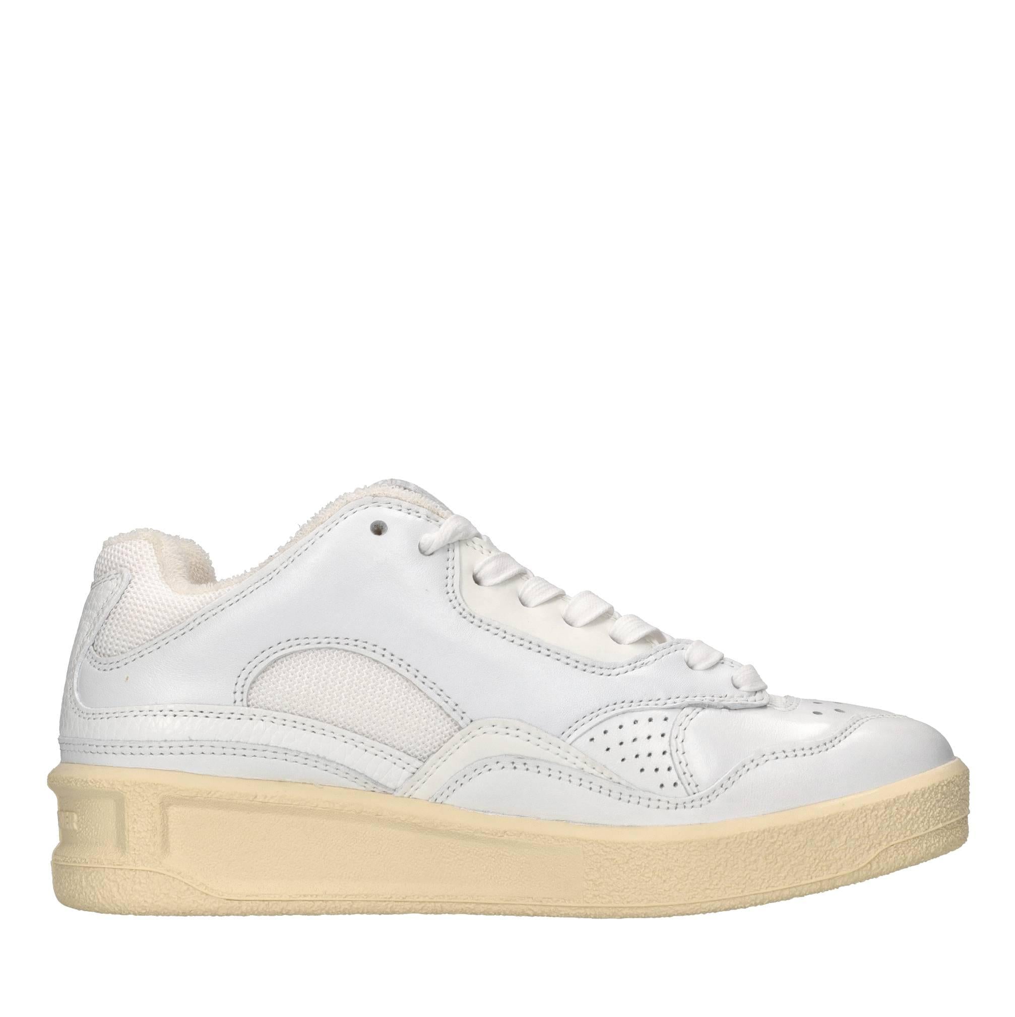 Sneakers in pelle e tessuto 