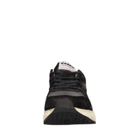 Sneakers in pelle e tessuto 