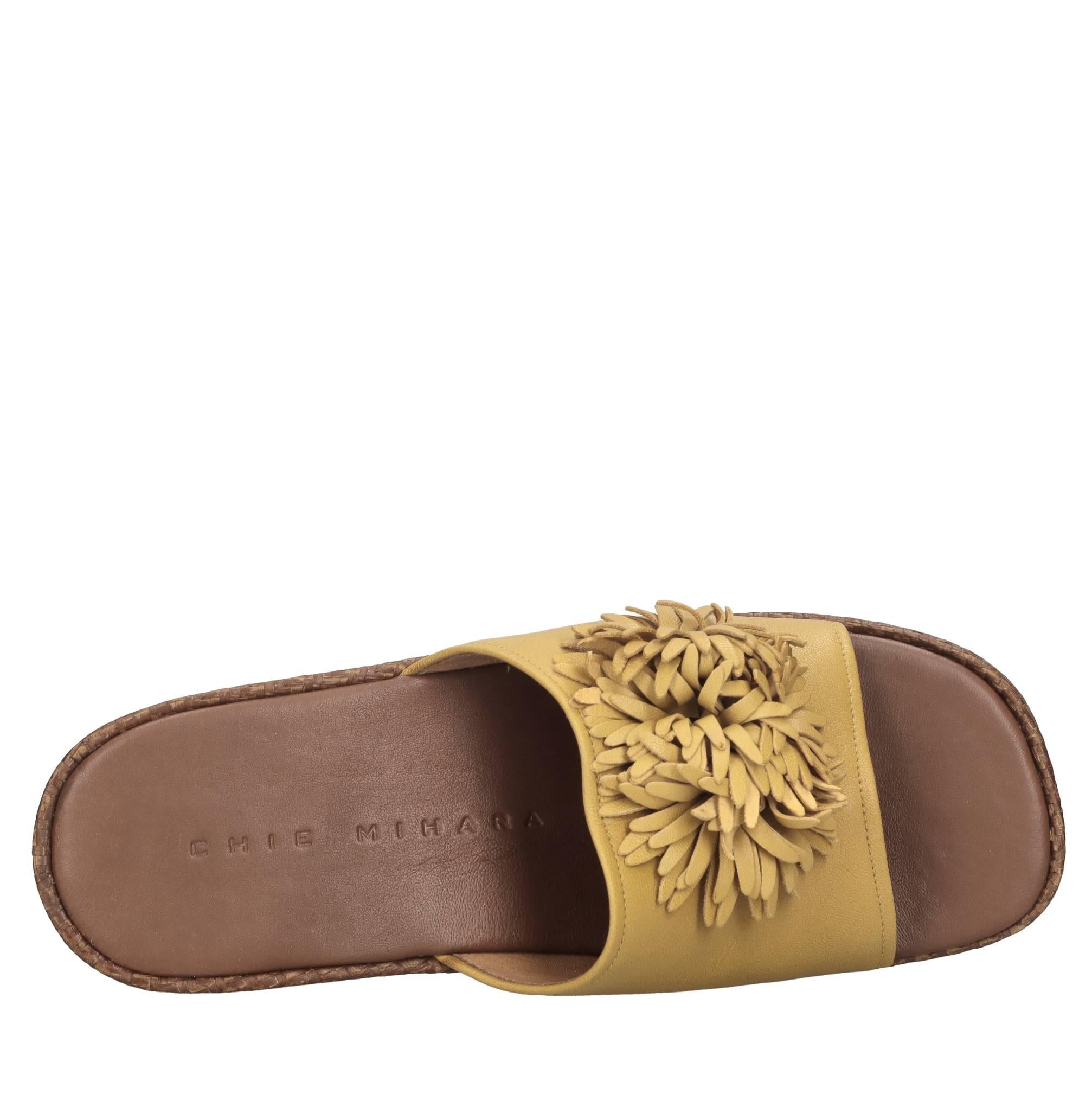 Mules in pelle e rafia 