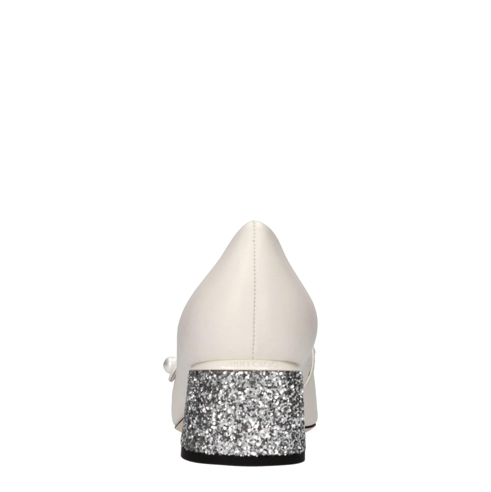Décolleté in pelle e glitter 