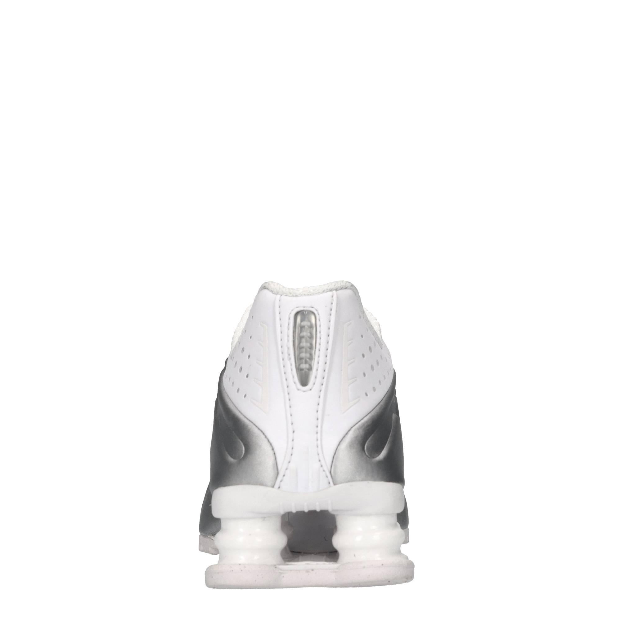 Sneakers in ecopelle e tessuto 