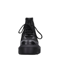 Sneakers in pelle e tessuto 