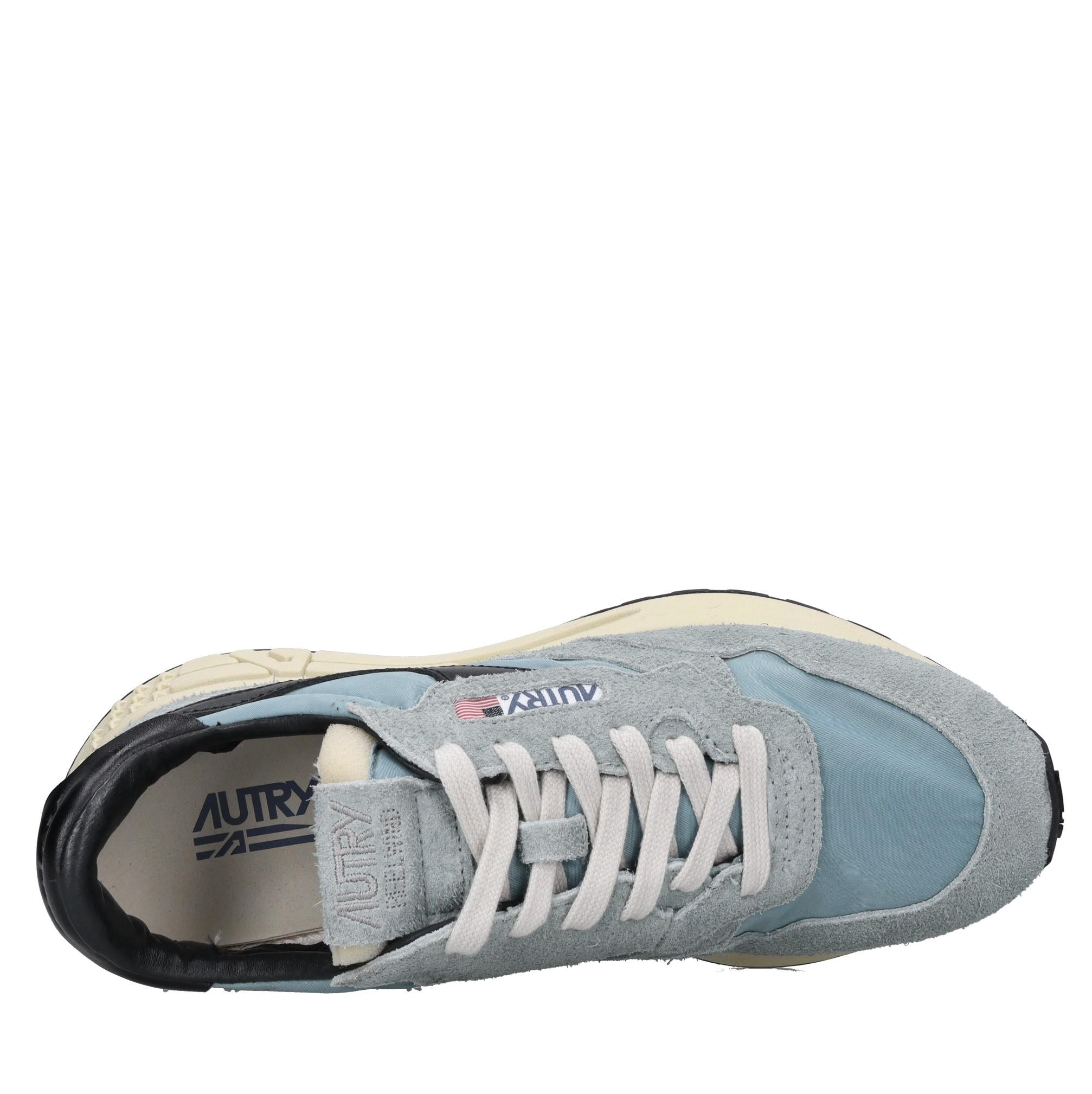 Sneakers in pelle camoscio e tessuto 