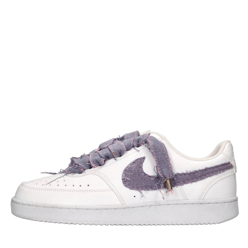 Sneakers in ecopelle e tessuto 