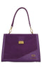 LA CARRIE Irregular medium bag in leather and suede