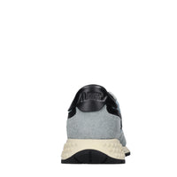 Sneakers in pelle camoscio e tessuto 