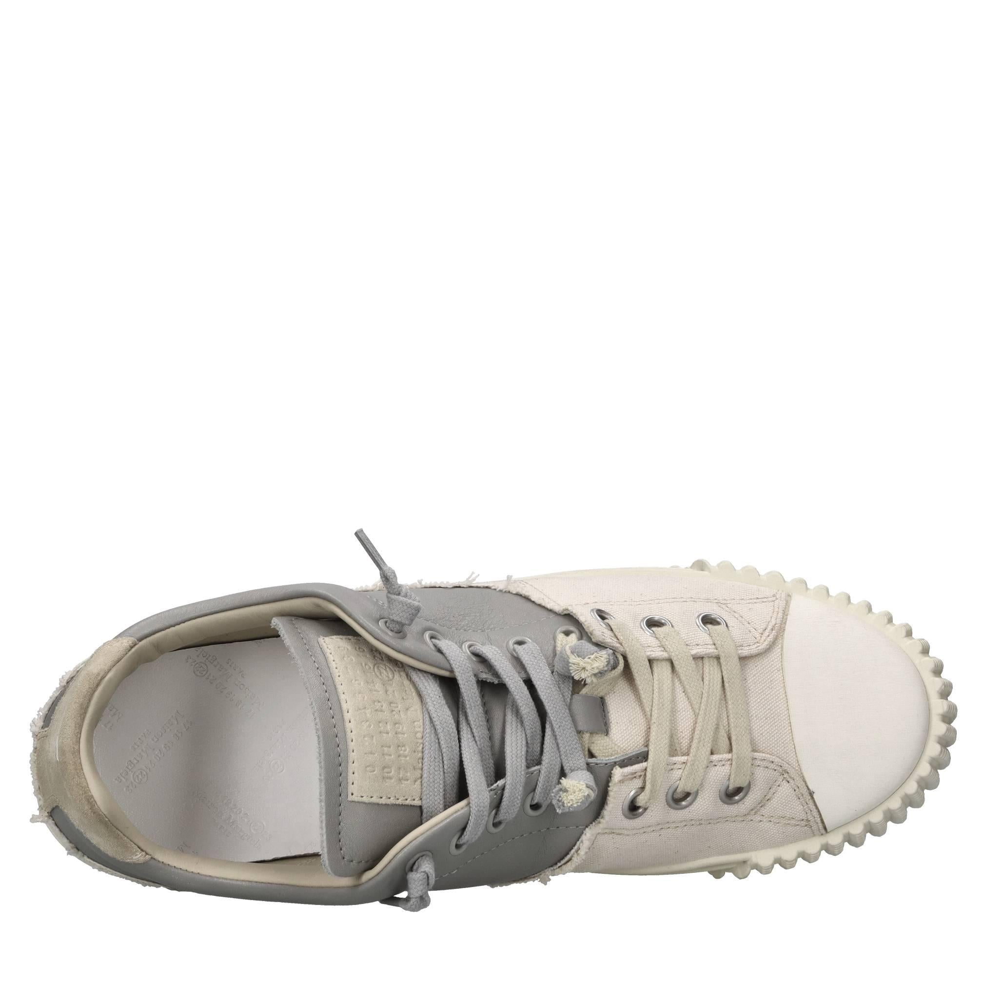 Sneakers in pelle e tessuto 