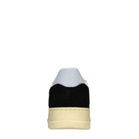 Sneakers in pelle e tessuto 
