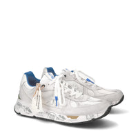 Sneakers in pelle scamosciata e tessuto 