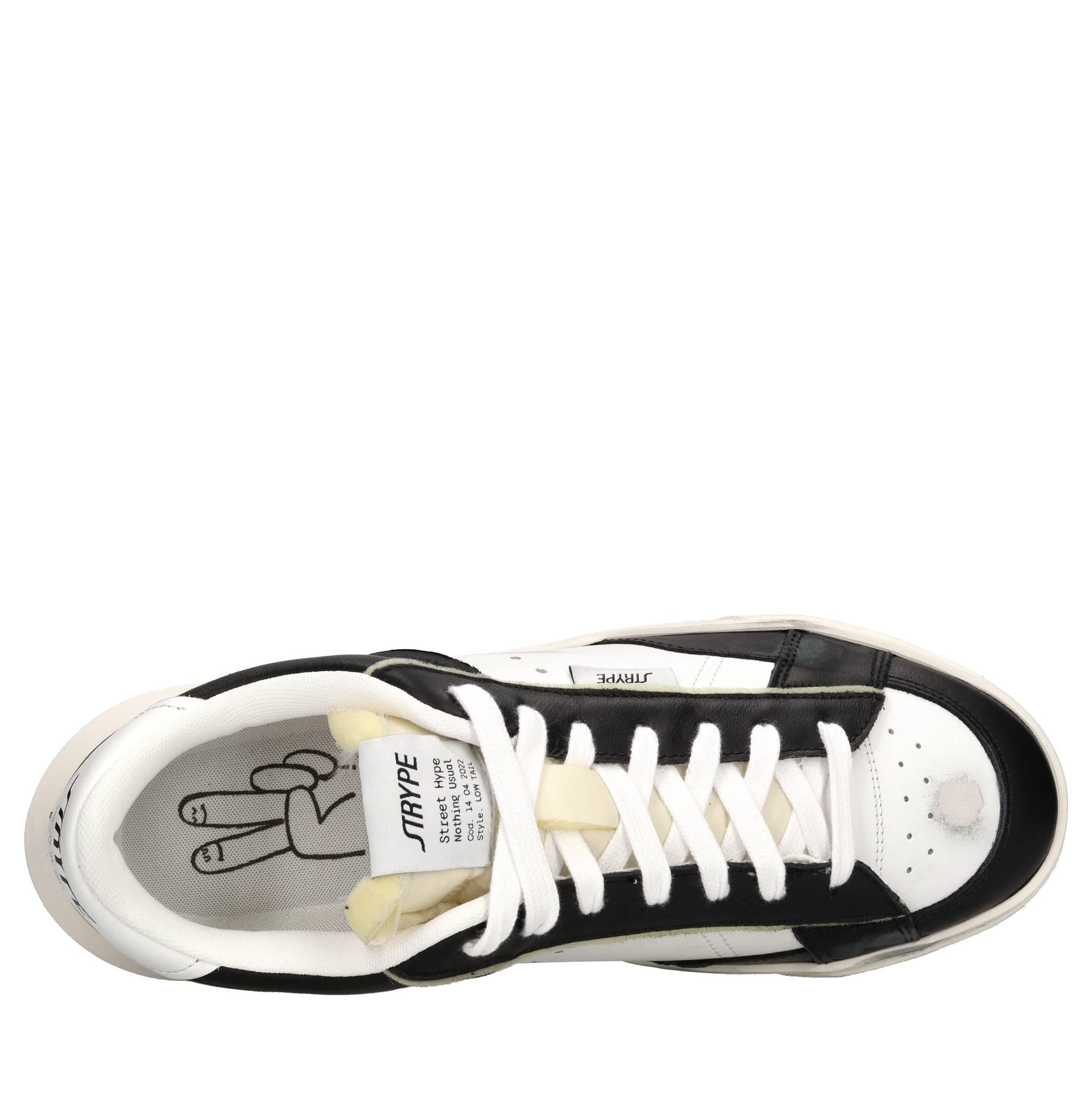 Sneakers in pelle e tessuto 