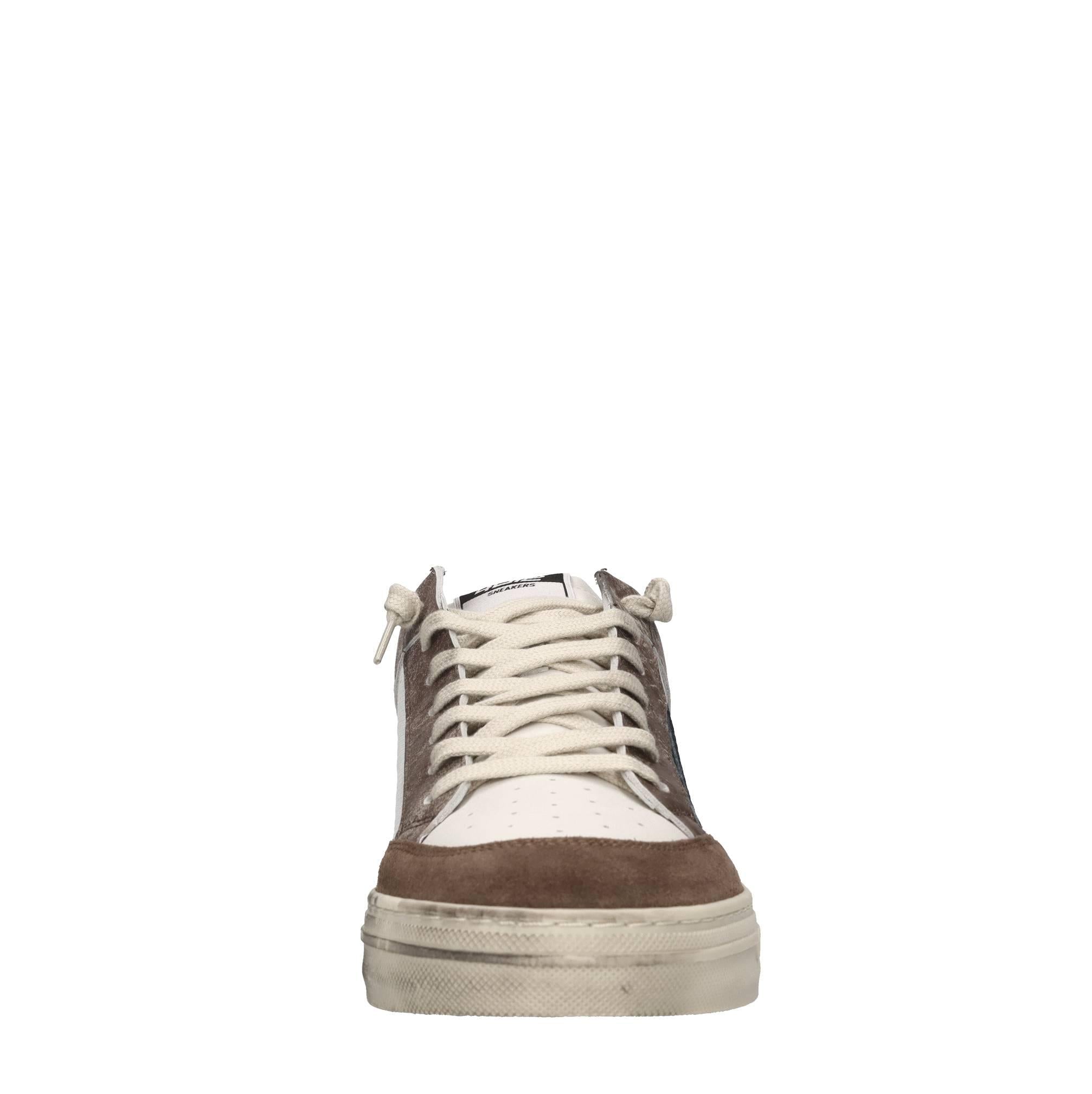 Sneakers in pelle e tessuto 