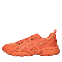 Sneakers in ecopelle e tessuto 