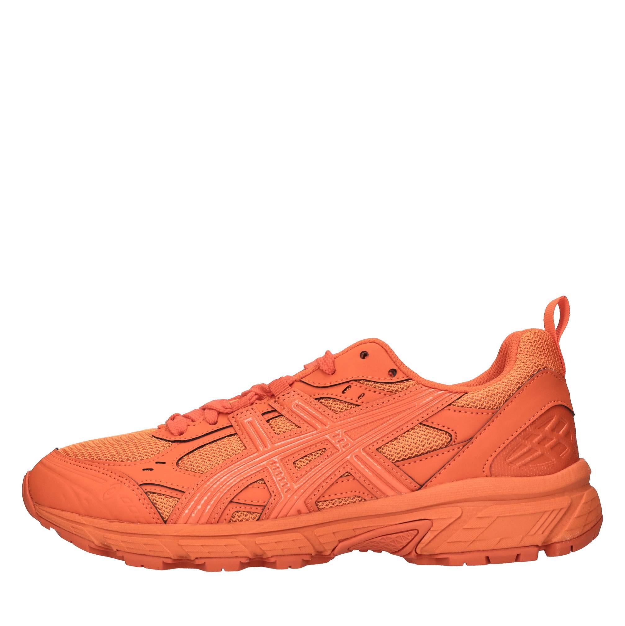 Sneakers in ecopelle e tessuto 