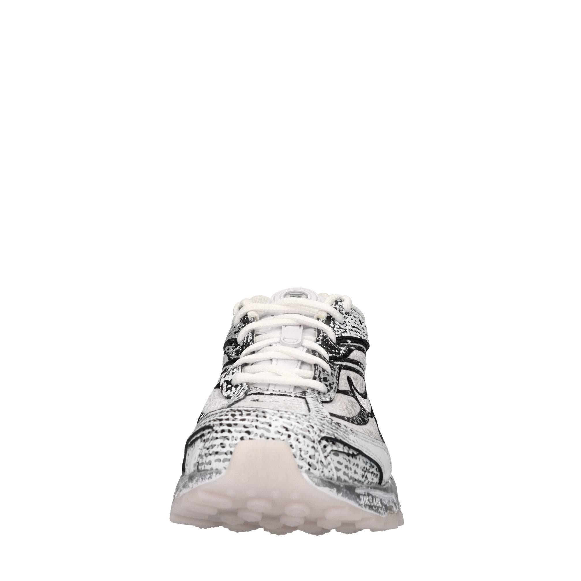 Sneakers in ecopelle e tessuto 