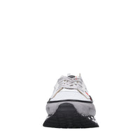 Sneakers in pelle e tessuto 