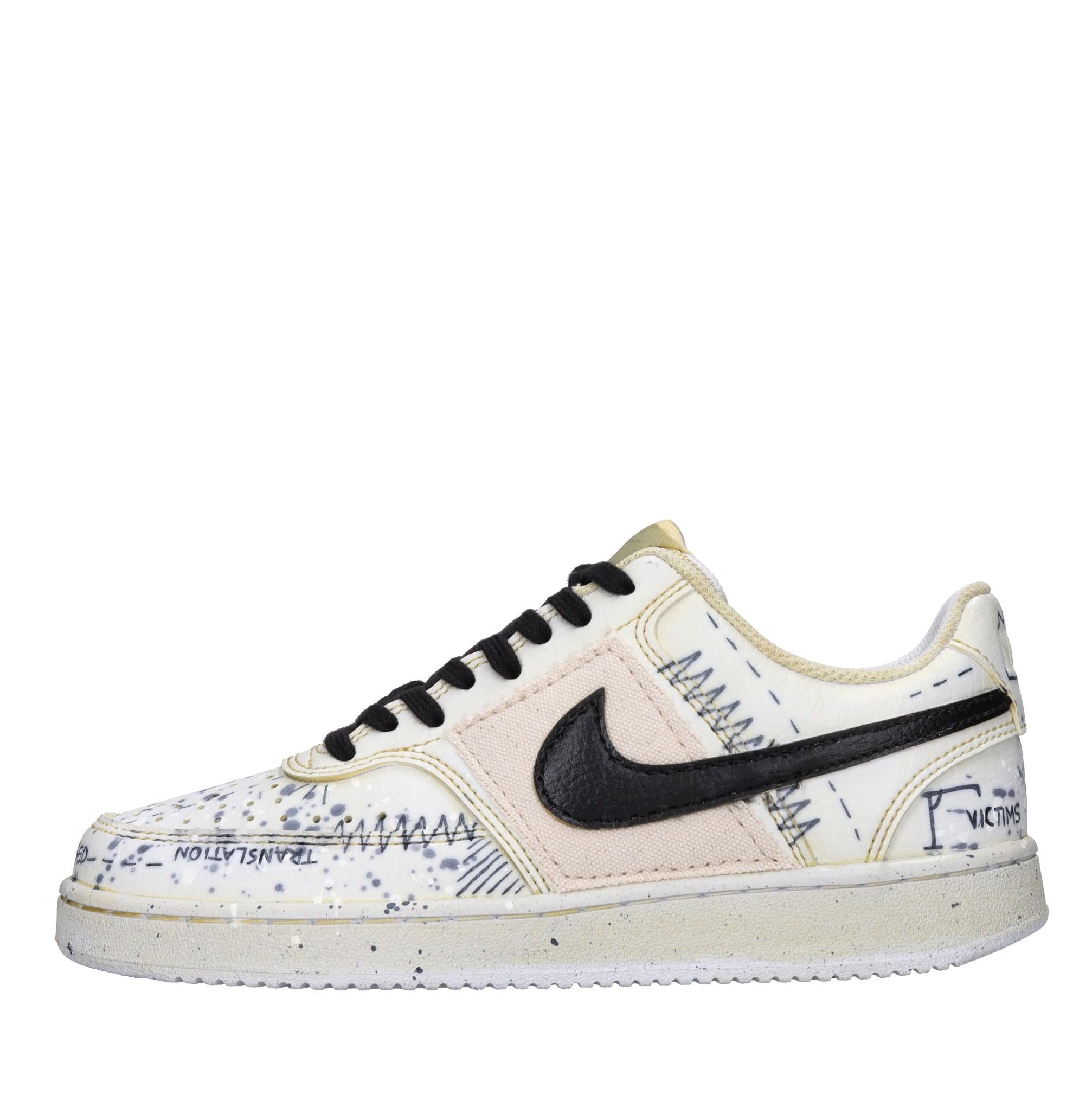 Sneakers in ecopelle e tessuto 