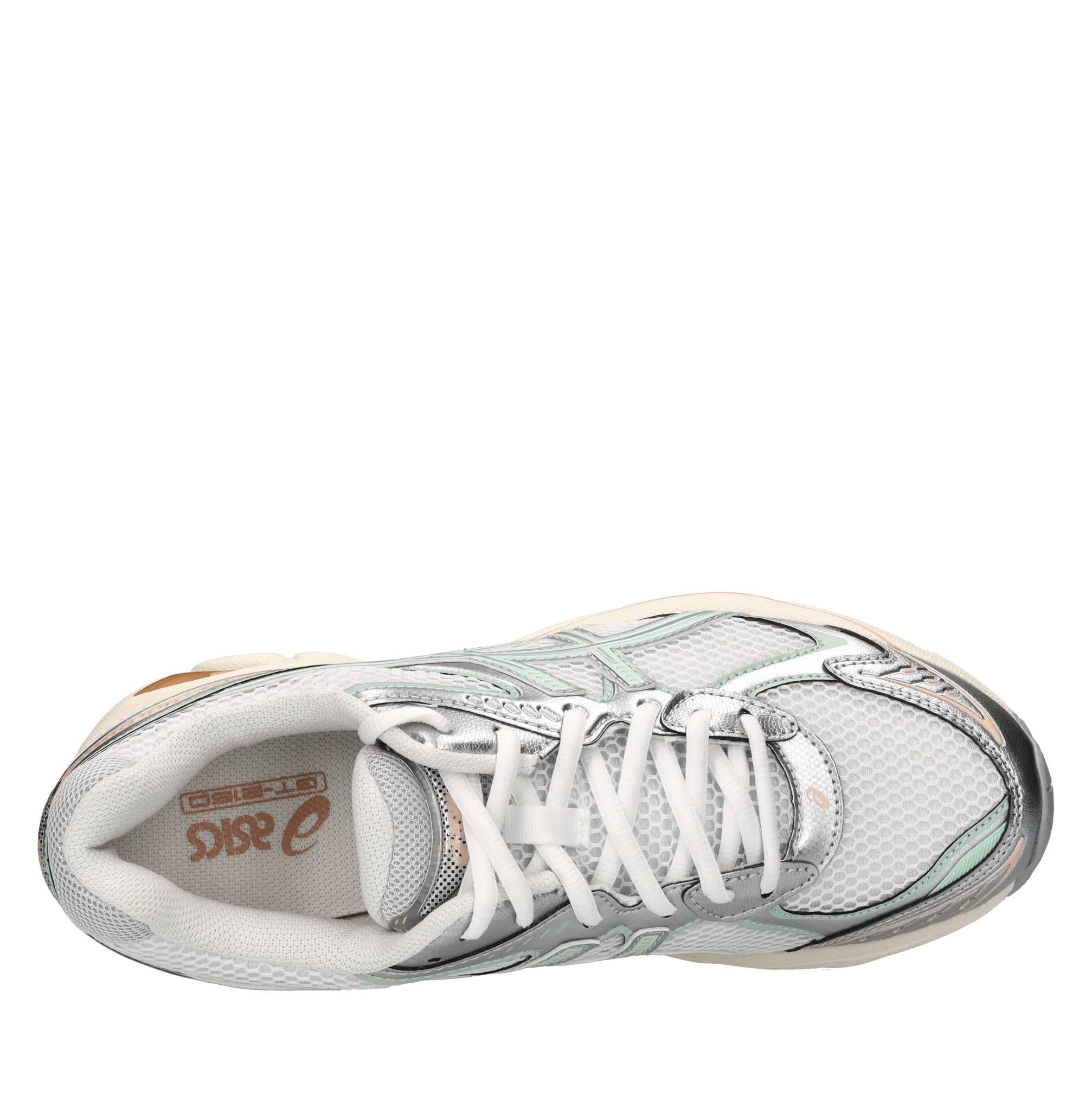 Sneakers in ecopelle e tessuto 