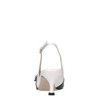 Décolleté slingback in pelle e vernice 