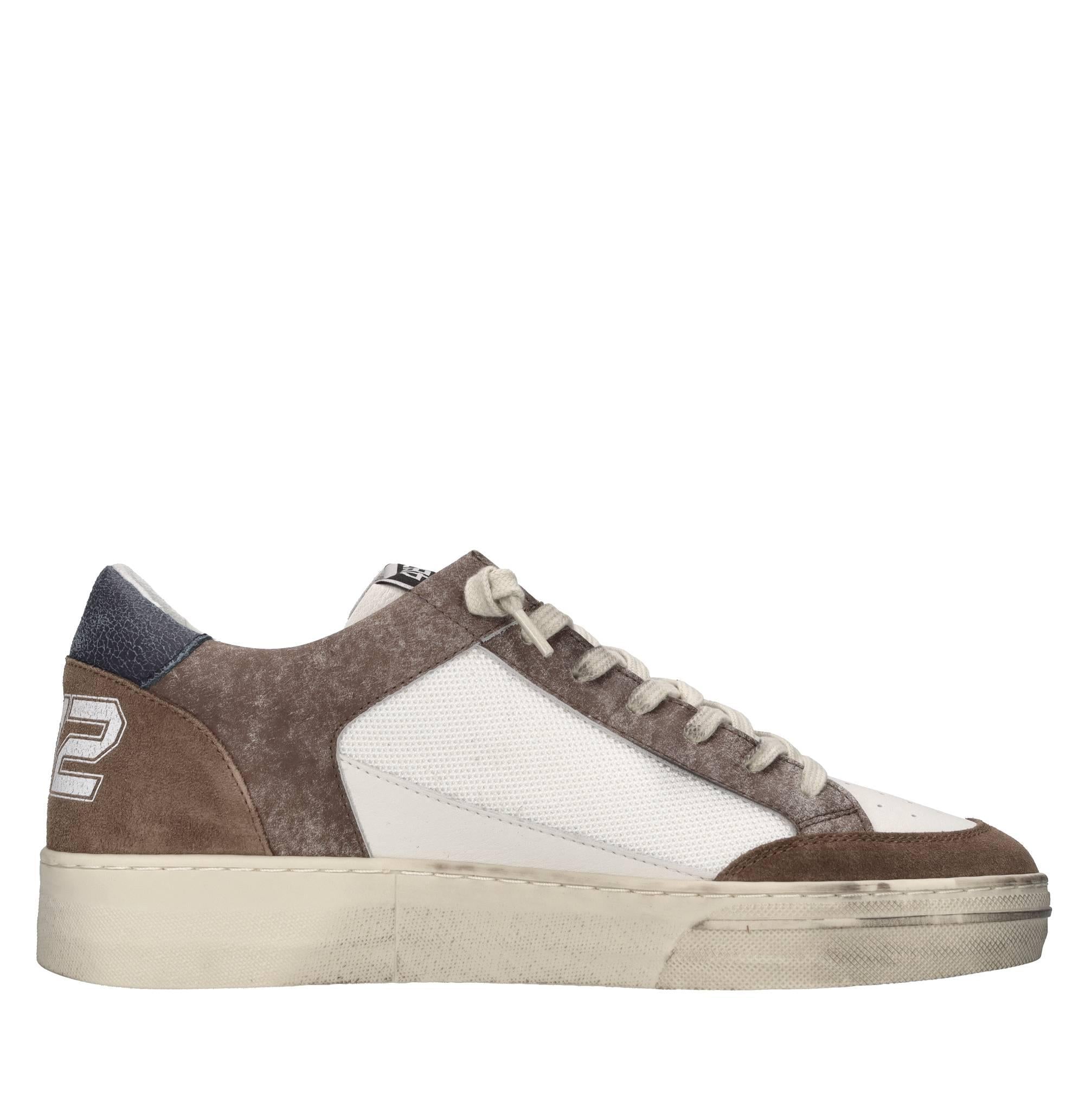 Sneakers in pelle e tessuto 