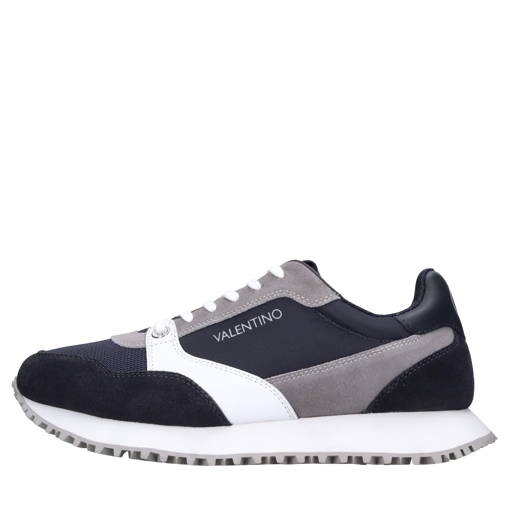 Sneakers in pelle e tessuto 