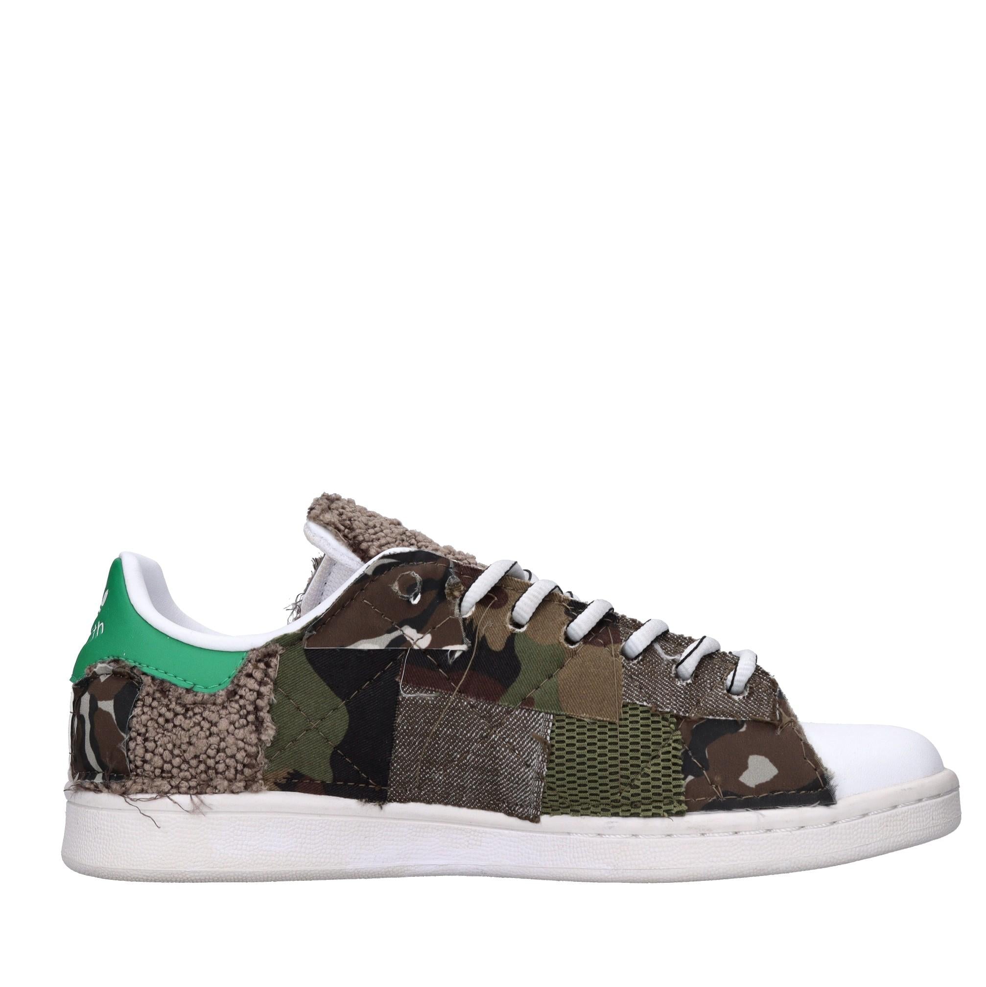 Sneakers in pelle e tessuto 