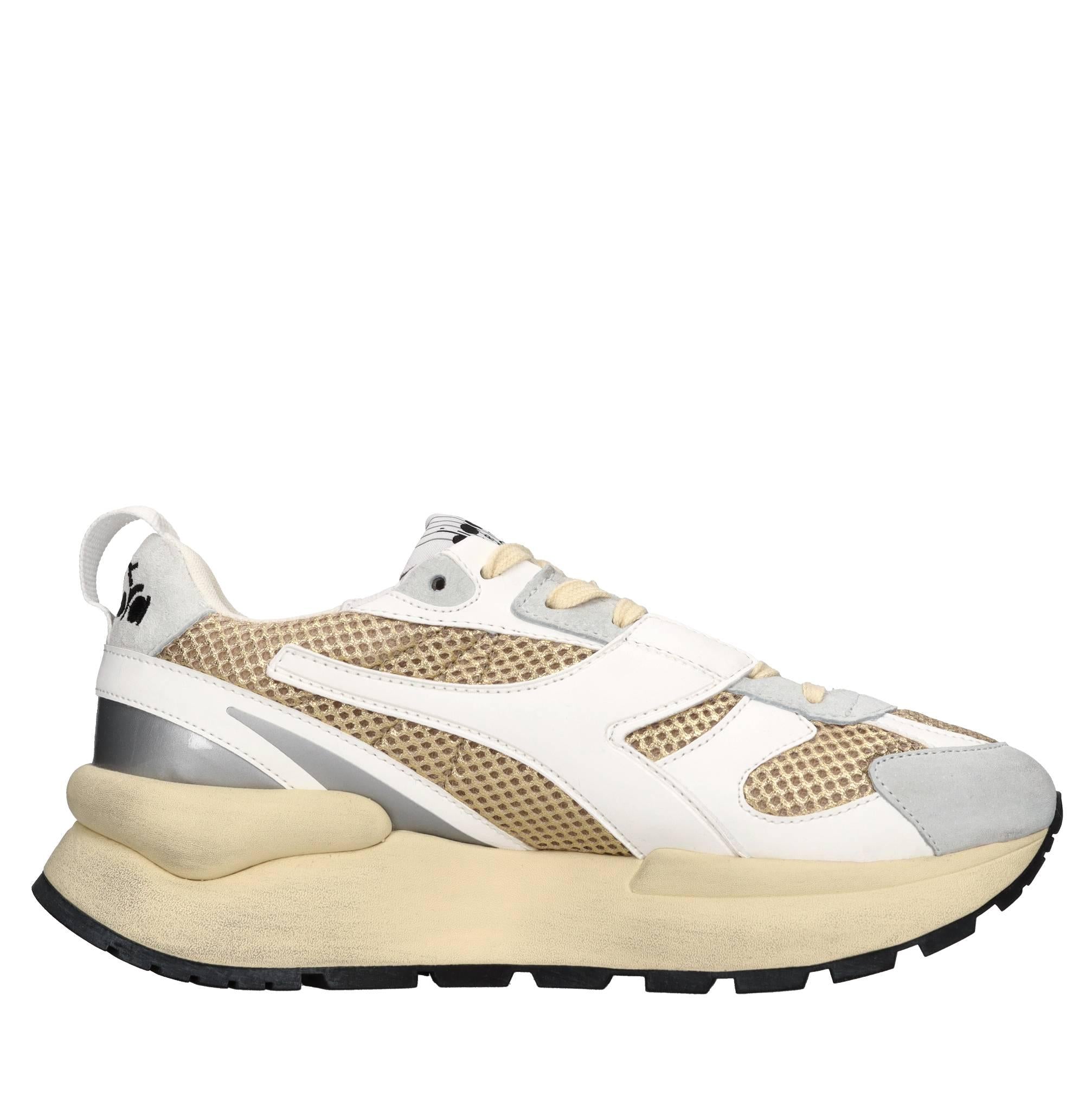 Sneakers in pelle e tessuto 