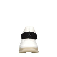 Sneakers in ecopelle e tessuto 