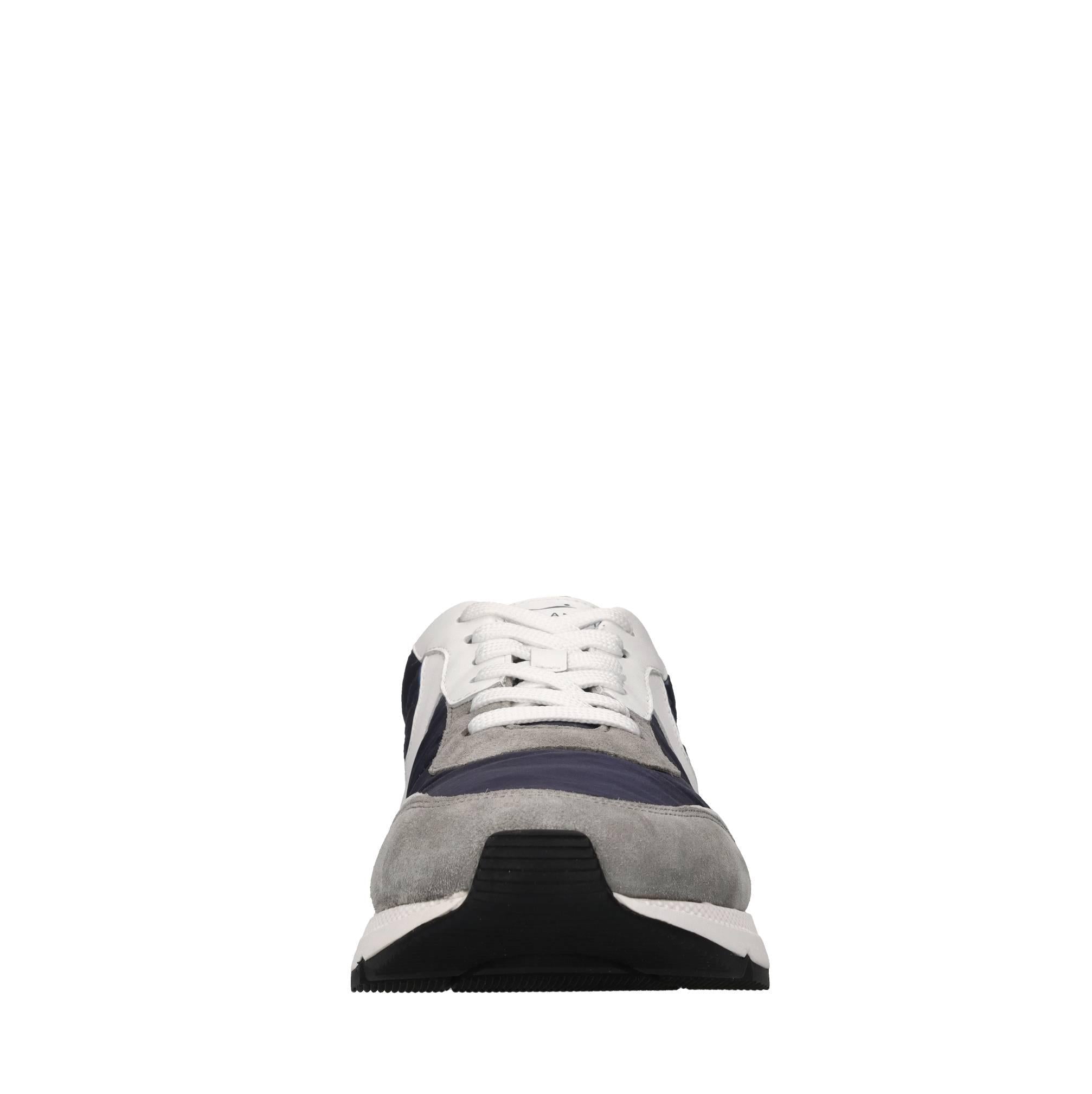 Sneakers in pelle e tessuto 
